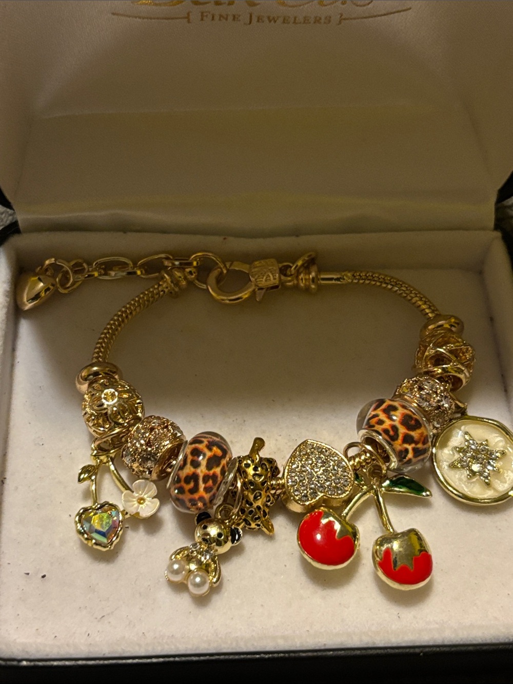 Gold-Tone Charm Bracelet with Leopard Beads and Red Cherry Charms